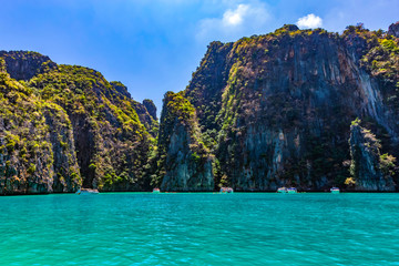 Naklejka na ściany i meble Take a boat to see the beauty of Phi Phi Leh at Pileh Bay and Loh Samah Bay.