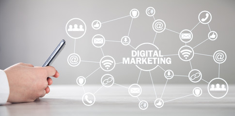 Hand using phone. Concept of Digital Marketing