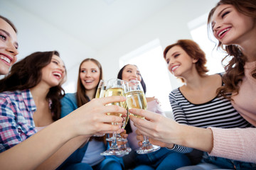 Cropped close-up low below angle view of nice lovely charming attractive cheerful ladies tasting wine wineglass great event greetings congrats wedding in light white interior room indoors