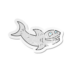 retro distressed sticker of a cartoon shark