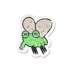 retro distressed sticker of a cartoon fly