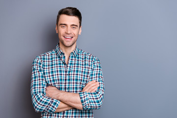 Close up photo attractive amazing he him his man hands arms crossed self-confident laughing comic situation perfect stubble styling wearing casual plaid checkered outfit isolated grey background