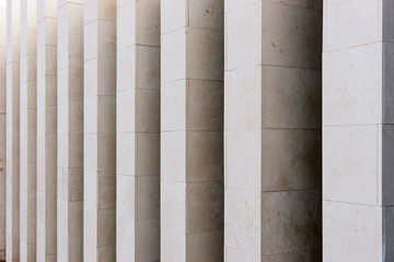 Modern architecture. Angular light columns as background