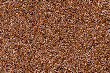 Brown flax seeds background