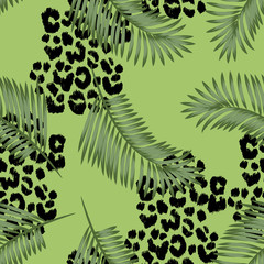 Vector seamless pattern with leopard texture and palm exotic leaves © oladolka