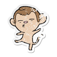 distressed sticker of a cartoon suspicious monkey