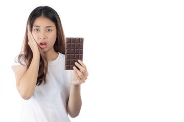 Asian beautiful woman with a happy smile holding a hand chocolate isolated on a white background.