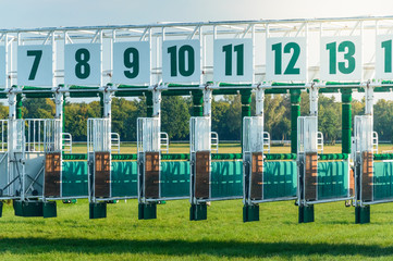 Riding competitions, starting gates for horses.