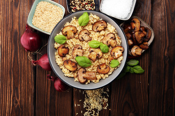 risotto with mushrooms, fresh herbs and parmesan cheese