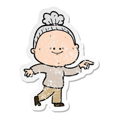 distressed sticker of a cartoon happy old woman