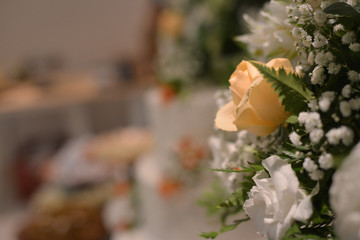 Special wedding decoration. tables, flowers, shoes, earrings and wedding dress. selective focus.