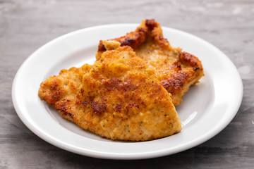 fried chicken breast on white plate