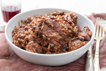 rice with rabbit and sauce in dish