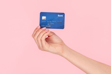 Woman showing card of bank 