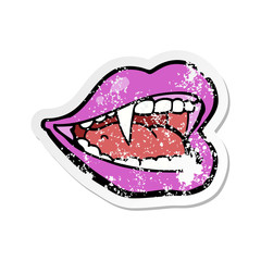 retro distressed sticker of a cartoon vampire mouth