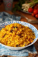 Spicy rice with spices and dried fruits.Healthy eating rice with spices.-