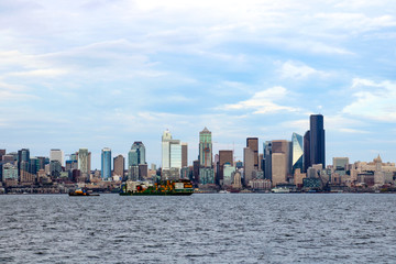 Fototapeta na wymiar Seattle waterfront Pier 55 and 54. Downtown view from ferry.
