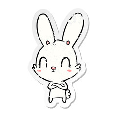 distressed sticker of a cute cartoon rabbit