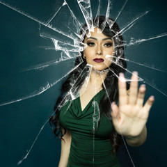 Beauty touching shattered glass