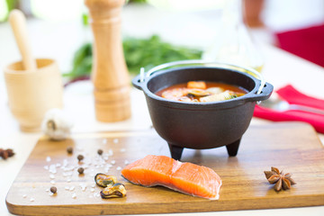 Bowl of Chowder soup with seafood and prawn shrimps.