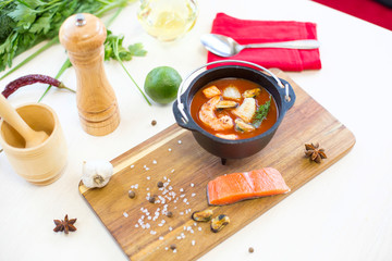Bowl of Chowder soup with seafood and prawn shrimps.