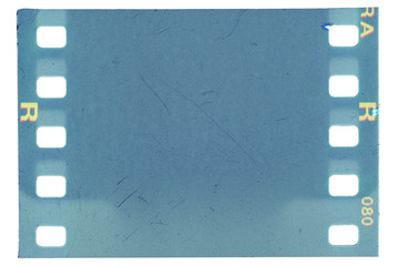 Film strip template with frame, empty color 135 type (35mm) film with scratches, cracks and light...