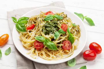 Spaghetti pasta with pesto sauce