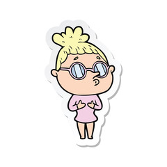 sticker of a cartoon woman wearing glasses