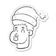 distressed sticker of a cartoon man wearing christmas hat