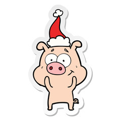 happy sticker cartoon of a pig wearing santa hat