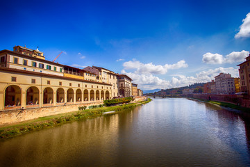 Fototapeta na wymiar View from Ponte Vecchio bridge over Arno river in Florence, Italy. 