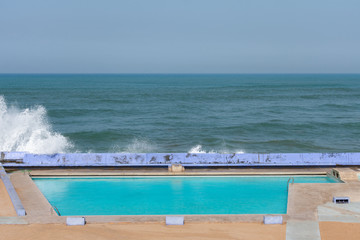 Resort Pool along the Atlantic Ocean in Casablanca Morocco with Waves
