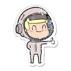 Obraz premium distressed sticker of a happy cartoon astronaut