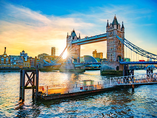 Beautiful landscape with the famous landmark of London, Tower Bridge reflected in the Thames river in sunset light in UK