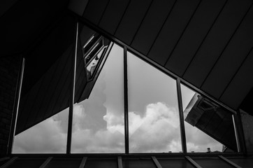 Modern architecture window and clouds