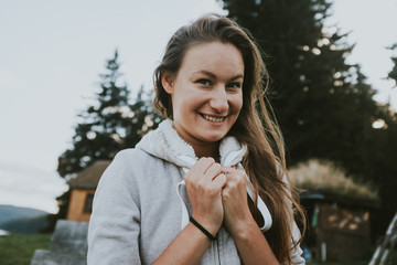 portrait of young woman in winter park