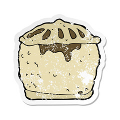 retro distressed sticker of a cartoon meat pie