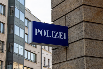 Blue sign with lettering Police in german language