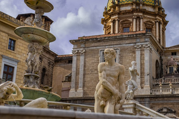 Fototapeta na wymiar Sculpture of the famous fountain of shame on baroque Piazza Pretoria, Palermo