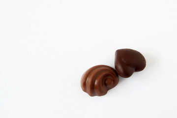 chocolate candies on white background