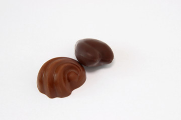 chocolate candies on white background
