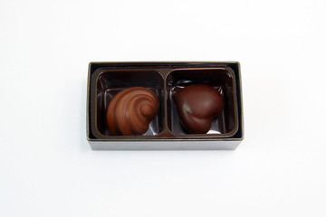 chocolate candies on white background