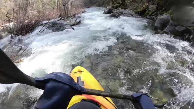 First person view of whitewater kayak on the Applegate River on the border of California and Oregon