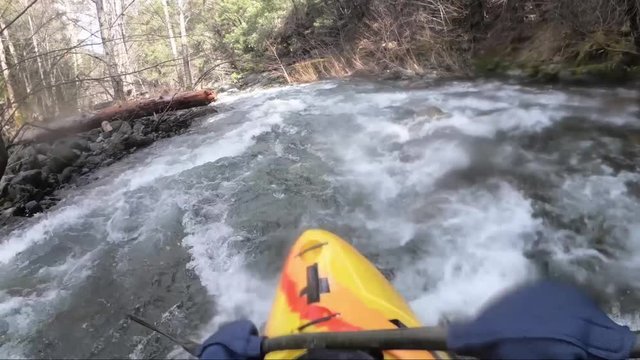 First person view of whitewater kayak on the Applegate River on the border of California and Oregon