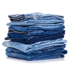 Stack blue jeans on white background isolation