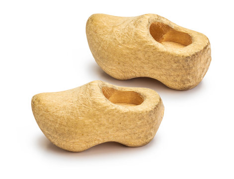 Small albarcas carved in wood (clogs, Cantabria, Cantabrian, Asturias, Galicia, Le&oacute;n, Holland). Isolated on white background.