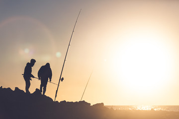 Fototapeta na wymiar Fisherman fishing during hot summer day