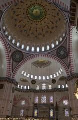 Fototapeta na wymiar fragment of the interior of the Suleymaniye mosque with the main dome, the largest mosque in Istanbul.