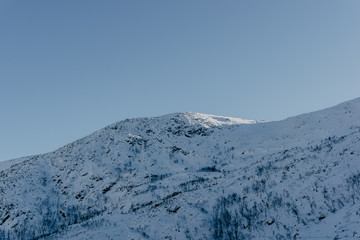 schneebedeckte Berge Fjord, Tromsö, Norwegen 