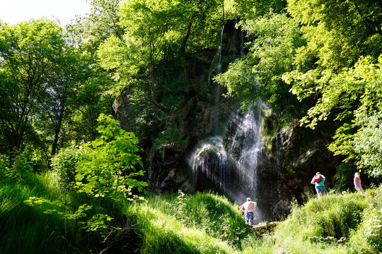 beautiful waterfall bad urach between trees